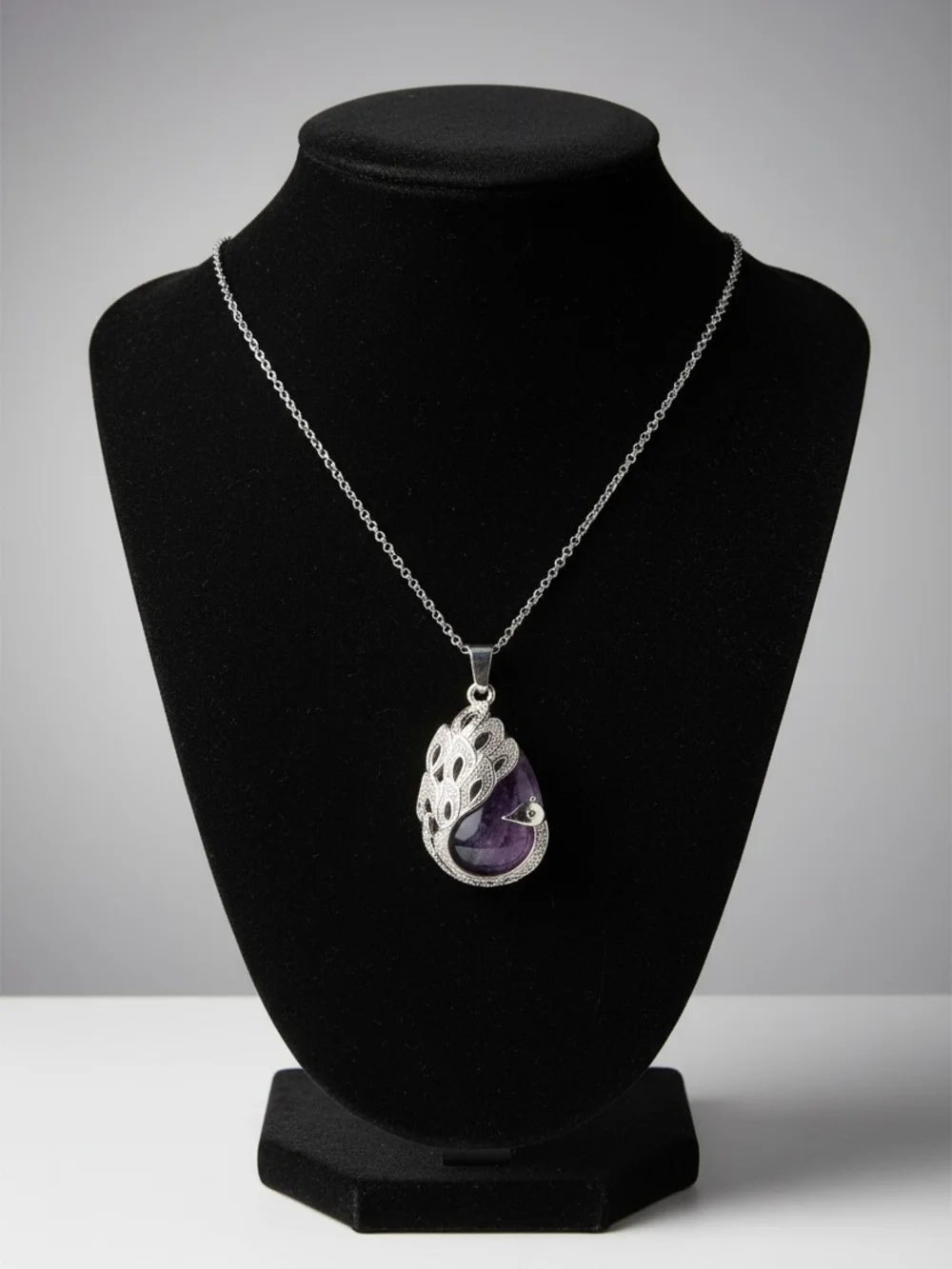 Silver Peacock Pendant Necklace with Purple Teardrop Gem